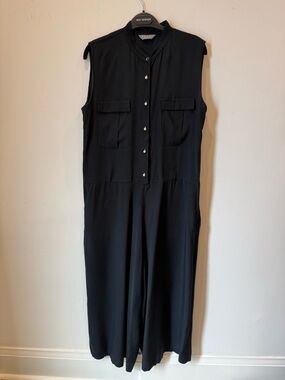 Black Sleeveless Pearl-Button Jumpsuit by Alani The Grey